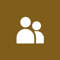 Two white silhouette figures on brown background.